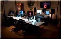 Studio Furniture - Producers desk in solid walnut - Black rack with smoked glass top - Fairlight Evo adjustable Nearfield stands - Jungle Studio 7, London.