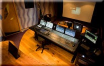 Studio Furniture - Producers desk in solid walnut - Black rack with smoked glass top - Fairlight Evo adjustable Nearfield stands - Jungle Studio 7, London.
